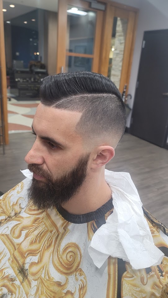 A fresh fade and beard finished at Wisconsin Barber in Georgetown
